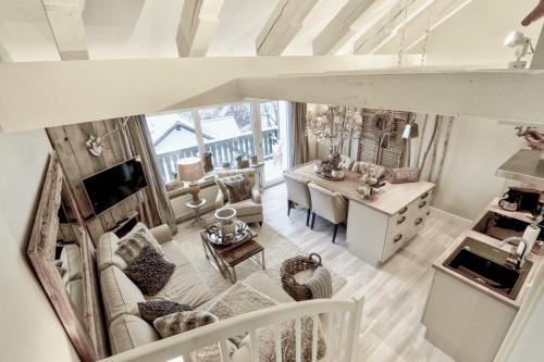 an aerial view of a living room at HOME Suites Maisonette mit Sauna in Braunlage