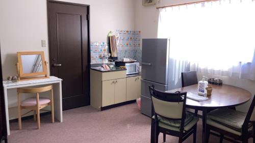 Kuchyň nebo kuchyňský kout v ubytování すずめのお宿 すずめの間 最大9名 Sparrow room Maximum of 9 people
