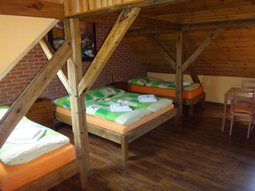 Posteľ alebo postele v izbe v ubytovaní Ubytování a apartmány Sluníčko
