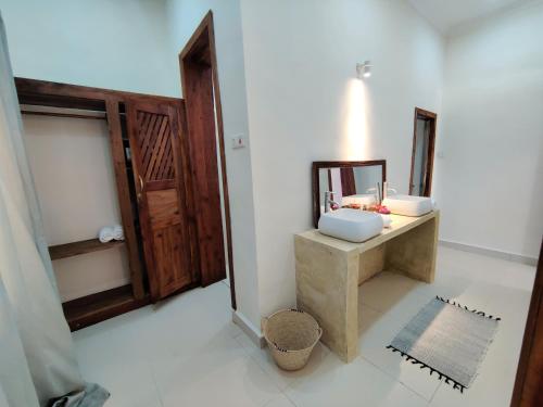 Kúpeľňa v ubytovaní Frangi'pwani