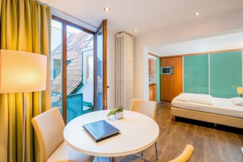 Postel nebo postele na pokoji v ubytování Hotel Am Nockherberg