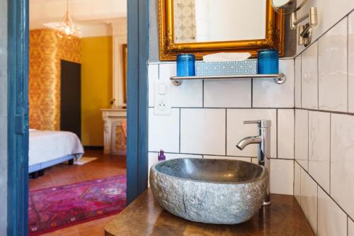 Koupelna v ubytování Logement Onze Chambres & Gîtes
