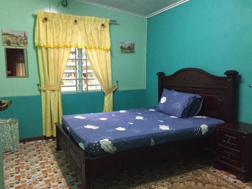 Postel nebo postele na pokoji v ubytování Seri Pengkalan Homestay