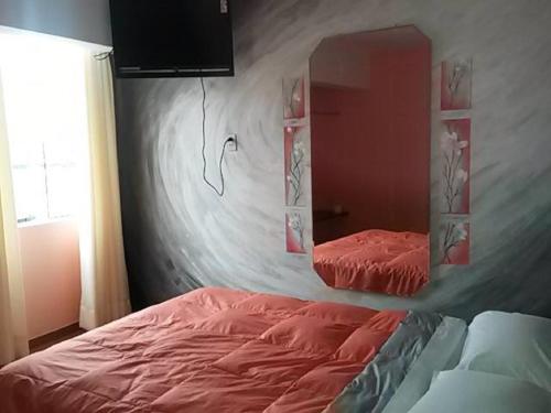 Postel nebo postele na pokoji v ubytování La Posada del Rey - Lima Airport Hostel