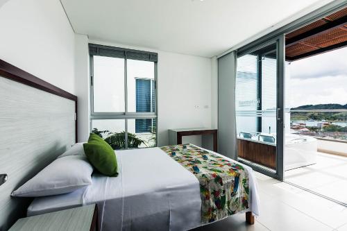 Postel nebo postele na pokoji v ubytování Hotel Santorini