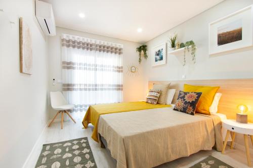 En eller flere senge i et værelse på Zen Garden Penthouse