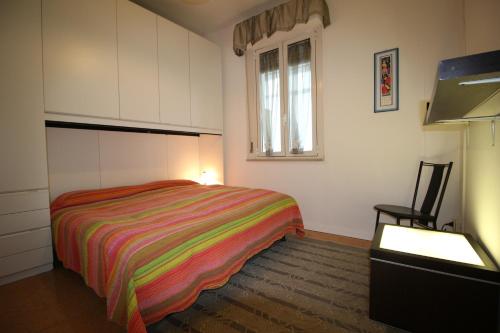 Un pat sau paturi într-o cameră la Casamare Rocca Priora