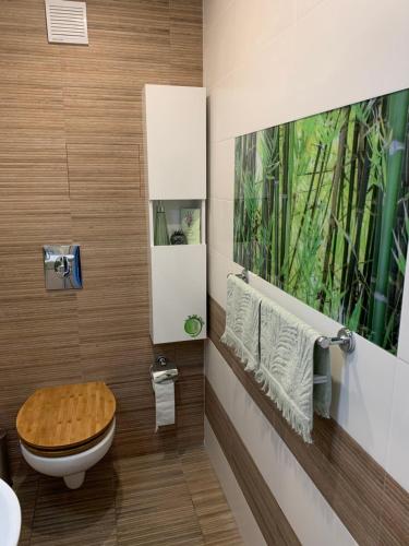 A bathroom at Lovely penthouse with an indoor fireplace