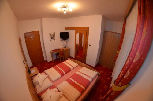 Cama o camas de una habitación en Garni Ossi
