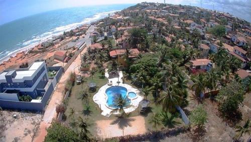 an aerial view of a resort with a swimming pool at Pousada Canoa Beach in Canoa Quebrada