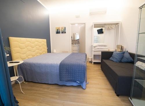 Postel nebo postele na pokoji v ubytování B&B La Marisa