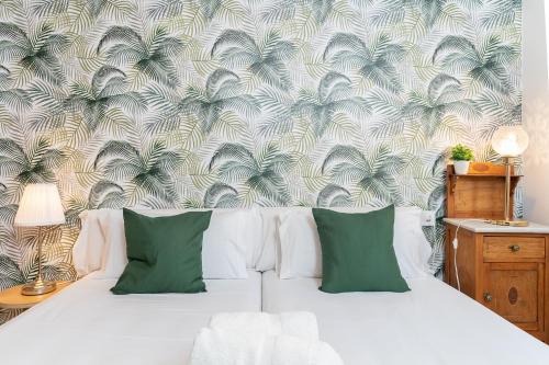 En eller flere senge i et værelse på MONKÓ LAS PALMERAS