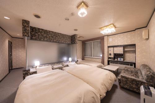 เตียงในห้องที่ Hotel Liberte Asahikawa