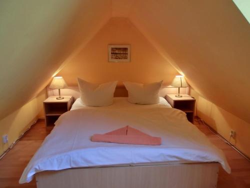 Postel nebo postele na pokoji v ubytování Ferienwohnung S26