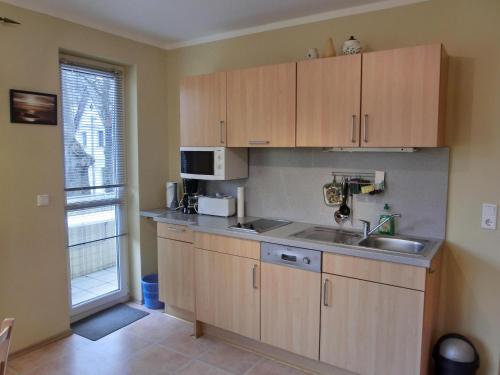 Kuchyň nebo kuchyňský kout v ubytování Ferienwohnung S49 "Ferienglück"