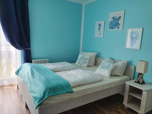 Postel nebo postele na pokoji v ubytování Ferienwohnung W17 0 N