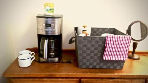 a counter with a coffee maker and a blender on it at Glacier Guest Room - PRIVATE ROOM IN SHARED HOUSE REDUCED PRICE ON TOURS in Juneau