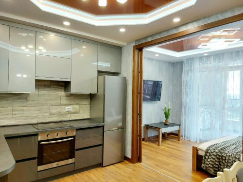 Una cocina o zona de cocina en Апартаменти Стрийська