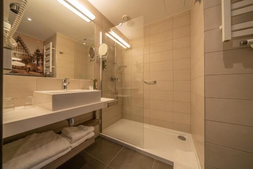 Ванная комната в Q Hotel Plus Wrocław