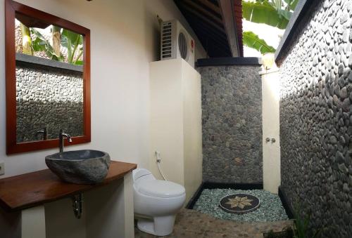 Kylpyhuone majoituspaikassa Mango Tree Inn