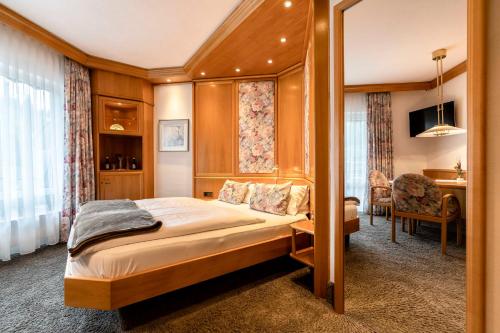 Postel nebo postele na pokoji v ubytování Hotel Restaurant Waldsägmühle