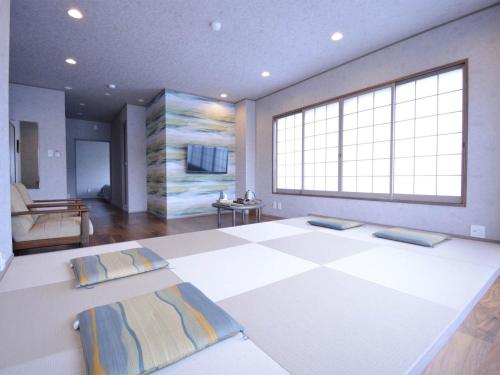 a room with a dance floor with a large window at Daigo - Vacation STAY 04186v in Kanayama