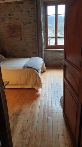 Postel nebo postele na pokoji v ubytování chambre et table d'hôtes La Grande Ourse