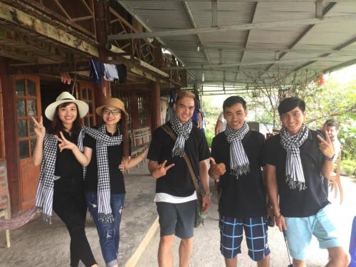 a group of people posing for a picture at ChienDe Homestay in Sa Pa