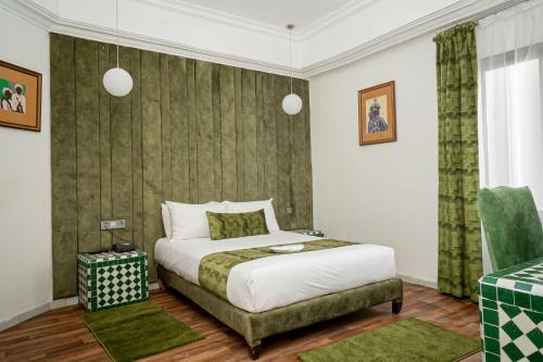 Postel nebo postele na pokoji v ubytování Hotel Majestic