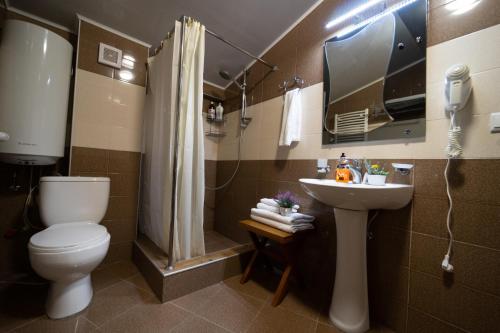 Koupelna v ubytování 2-room Apartment NFT Gudauri Penta 501