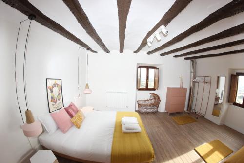 Postel nebo postele na pokoji v ubytování La Casa del Cura