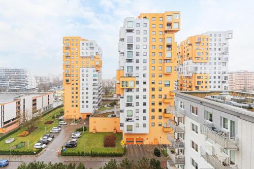 an aerial view of a city with tall buildings at Karawela Gdańsk Apartments by Renters in Gdańsk