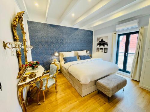 Ένα ή περισσότερα κρεβάτια σε δωμάτιο στο Cottage Wilkenburg - das luxuriöse und idyllische Ferienhaus