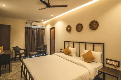 Tempat tidur dalam kamar di Amber Rooms