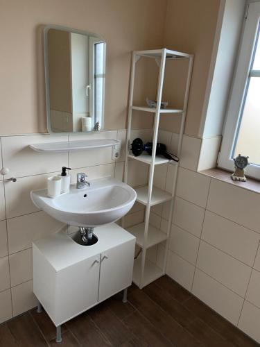 Ένα μπάνιο στο Ferienwohnung Zum Herold I