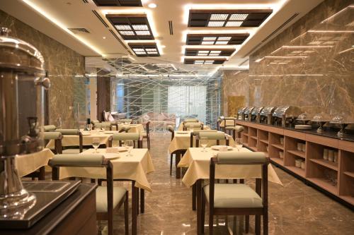Garden City Hotel Dubai 레스토랑 또는 맛집