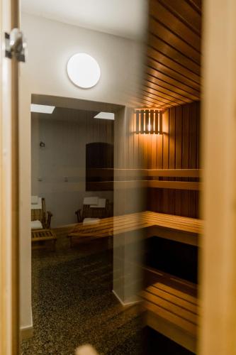 a view of a room through a door at Na Kopečku AD 1795 - penzion s restaurací a wellness v Podkrkonoší in Dvůr Králové nad Labem