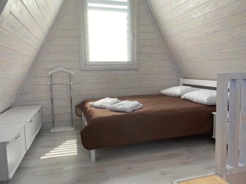 Posteľ alebo postele v izbe v ubytovaní Green Village