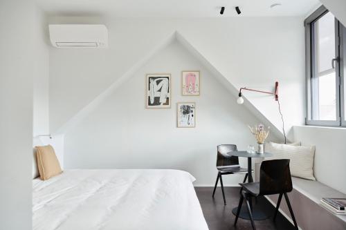 Postel nebo postele na pokoji v ubytování Edgar Guesthouse