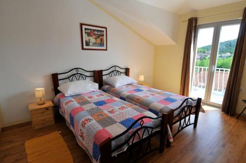 Ένα ή περισσότερα κρεβάτια σε δωμάτιο στο Apartment Fiorenini