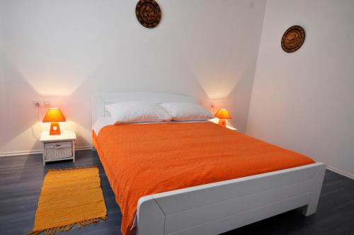 Ένα ή περισσότερα κρεβάτια σε δωμάτιο στο Apartment Fiorenini