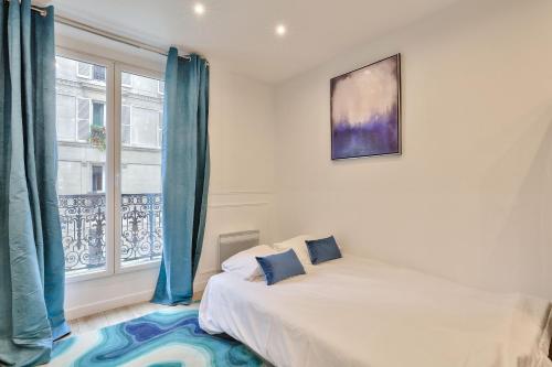 Katil atau katil-katil dalam bilik di 24 - Luxury Home in Paris Montorgueil