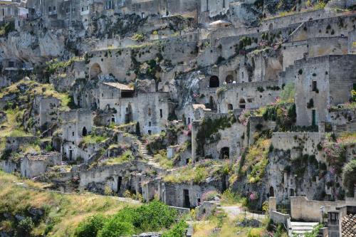 a village on the side of a mountain at SaxAurea in Matera