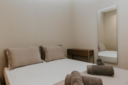 Ένα ή περισσότερα κρεβάτια σε δωμάτιο στο AIORA villas