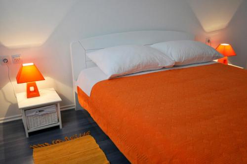 Ένα ή περισσότερα κρεβάτια σε δωμάτιο στο Apartment Fiorenini