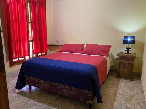 Ein Bett oder Betten in einem Zimmer der Unterkunft La Casa de Los Sueños