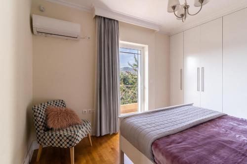 Katil atau katil-katil dalam bilik di Coastline maisonette near Athens Airport and Rafina Port