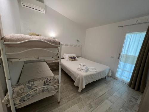 Ένα ή περισσότερα κρεβάτια σε δωμάτιο στο In campagna da Nino