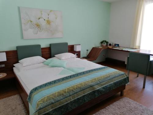 Hotel Die Residenzにあるベッド