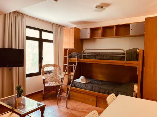 Postel nebo postele na pokoji v ubytování Apartamentos Bluettravel Snow Confort Monte Gorbea